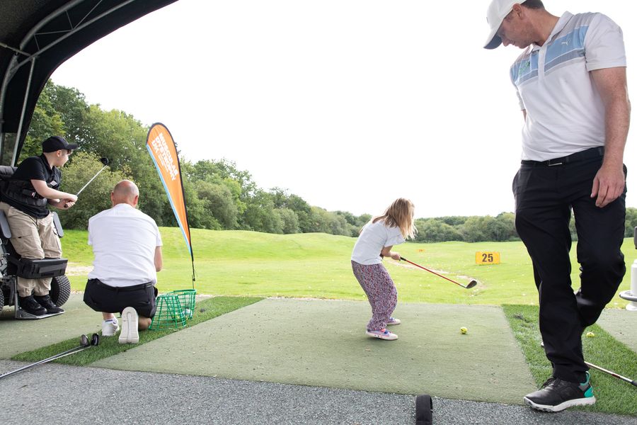 MAIN Adam Baker coaching at MD-AccessibleGolf-3744 (2).jpg